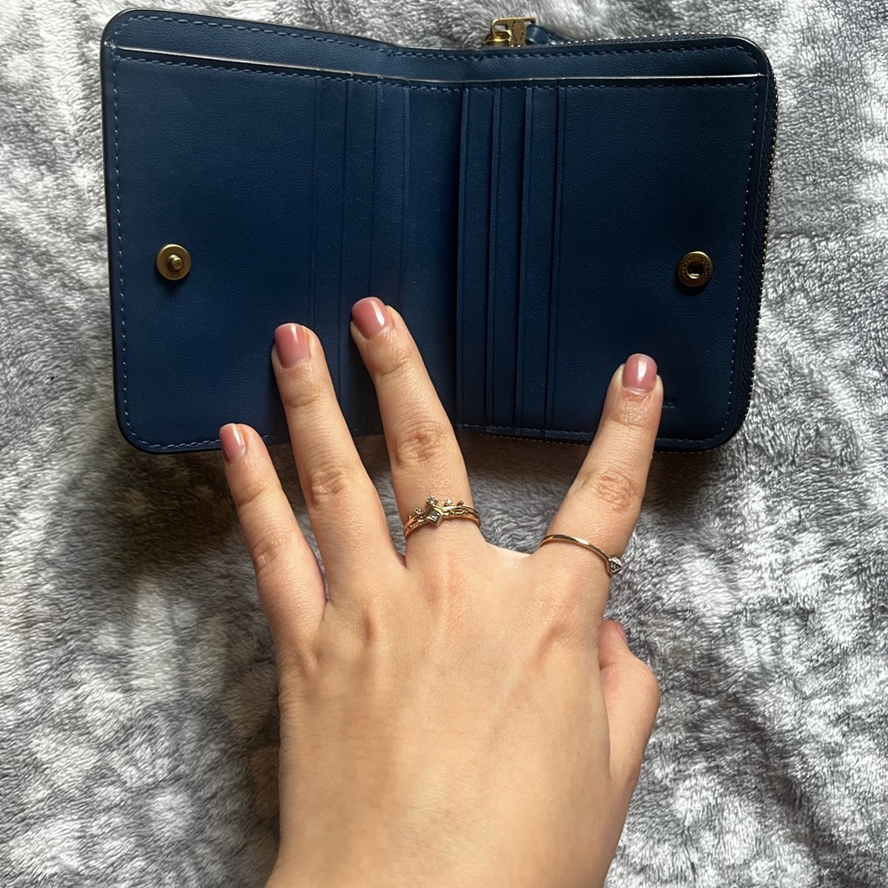 Coach stud bifold wallet